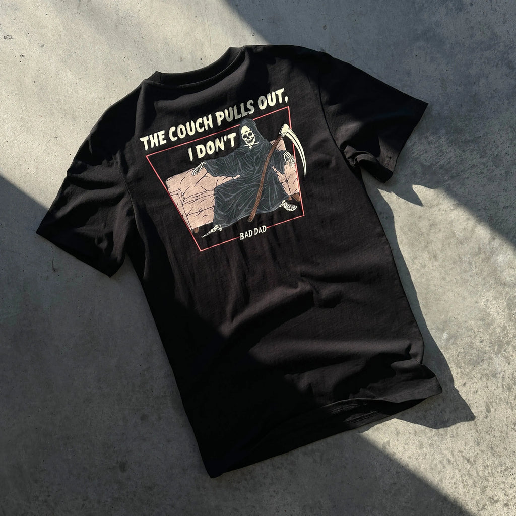 The Couch Pulls Out Shirt Laying Flat on the Floor